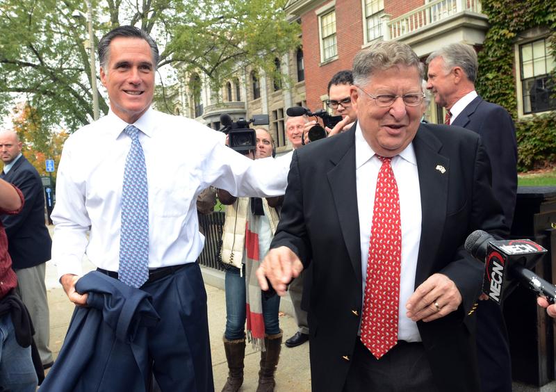 Republican presidential candidate former Massachusetts Gov. Mitt Romney greets former New Hampshire Governor John Sununu (R) outside the New Hampshire Statehouse.